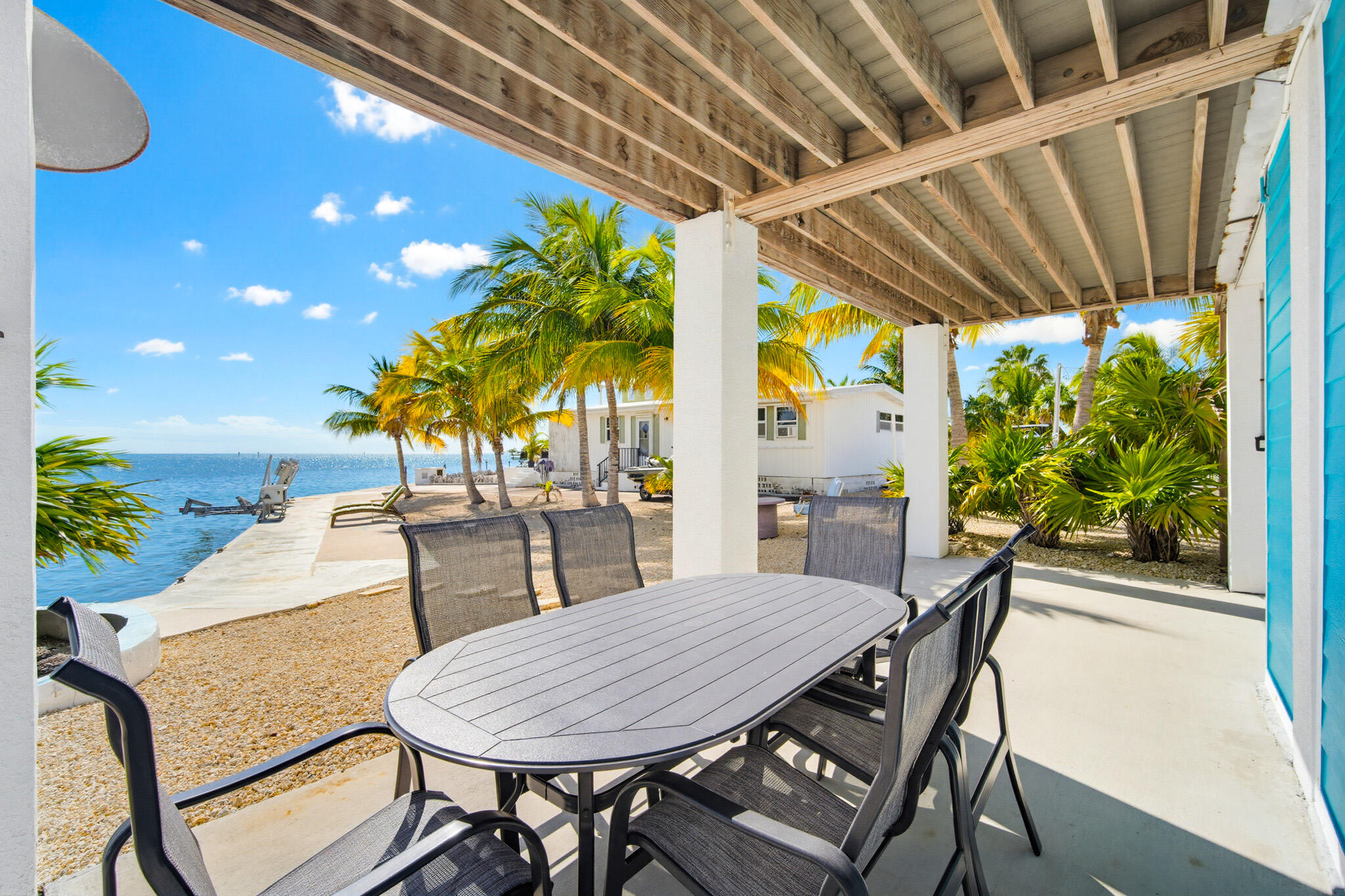 183 Star Lane Key West, FL 33040 - Photo 54 of 70 a view of an outdoor dining space with a table and chairs