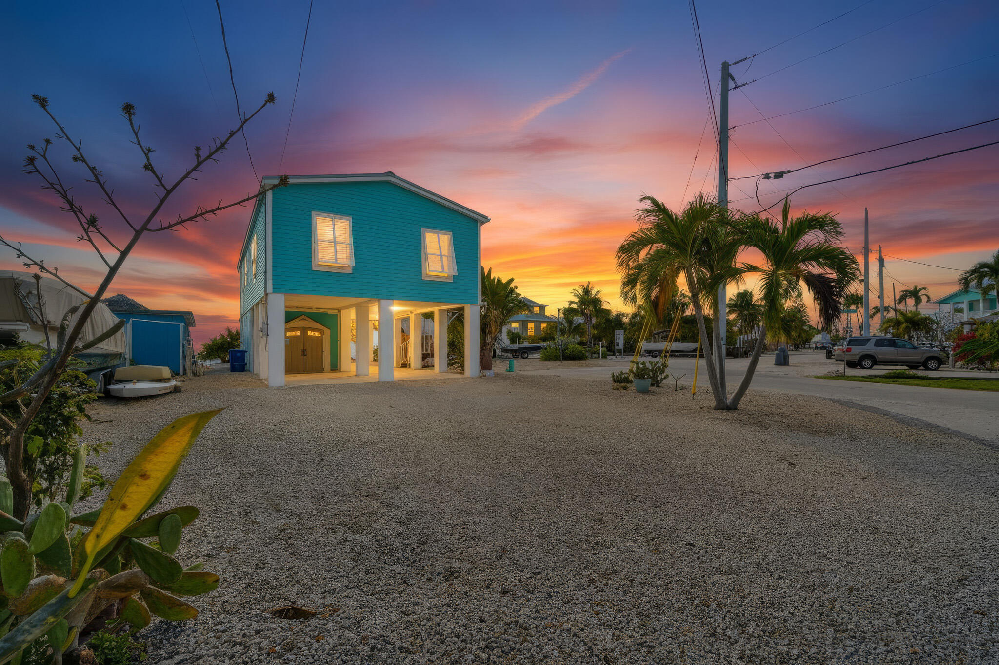183 Star Lane Key West, FL 33040 - Photo 64 of 70 a view of a house with a yard and garage