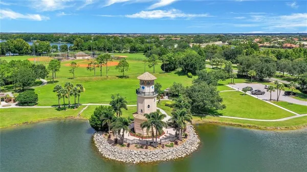 a view of a lake with a yard