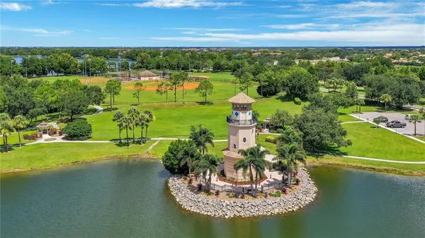 a view of a lake with a big yard