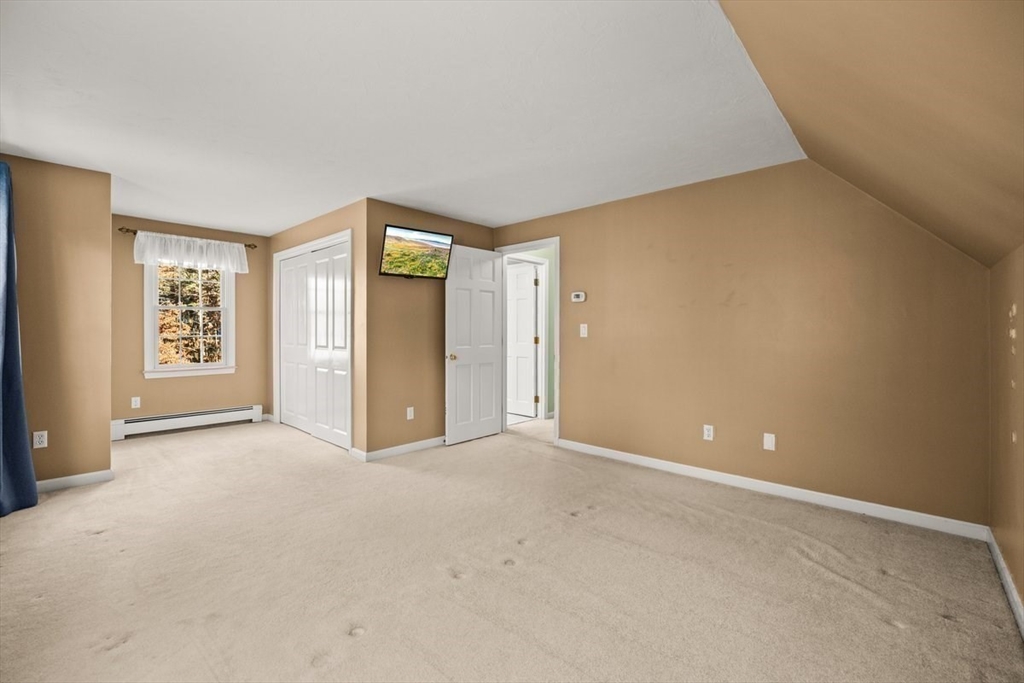 74 Higgins Road Kingston, MA 02364 - Photo 19 of 35 an empty room with windows and closet