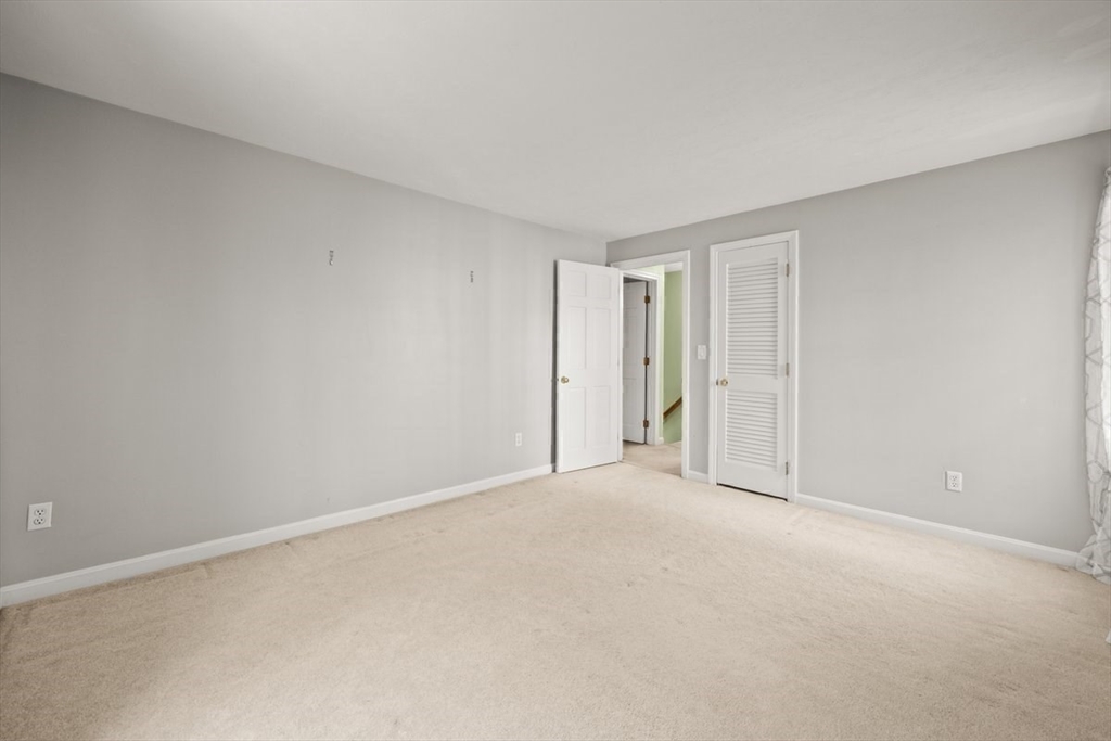 74 Higgins Road Kingston, MA 02364 - Photo 21 of 35 a view of an empty room and closet area