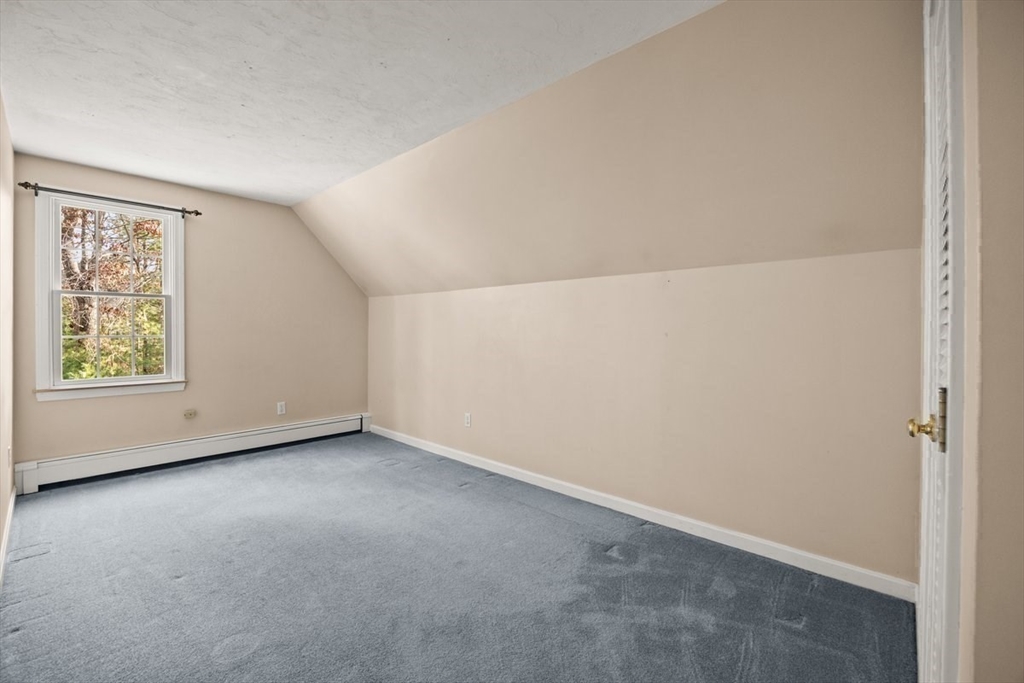 74 Higgins Road Kingston, MA 02364 - Photo 23 of 35 an empty room with windows