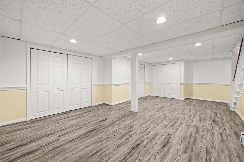 74 Higgins Road Kingston, MA 02364 - Photo 26 of 35 a view of an empty room with wooden floor