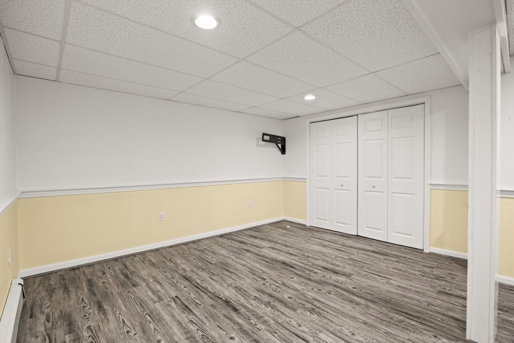 74 Higgins Road Kingston, MA 02364 - Photo 27 of 35 a view of empty room with wooden floor