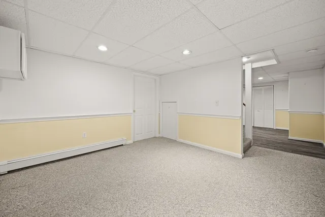 a picture of a bench in front of a window