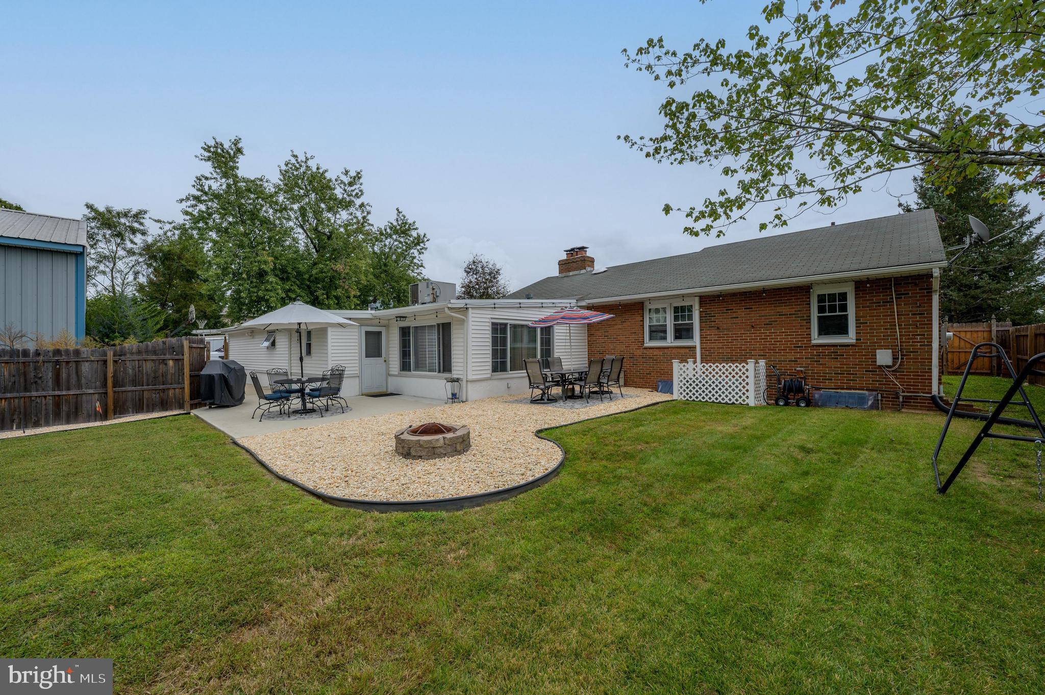 300 Grant Street Riverside, NJ 08075 - Photo 32 of 35 Gravel Patio with Fire Pit and Concrete Patio