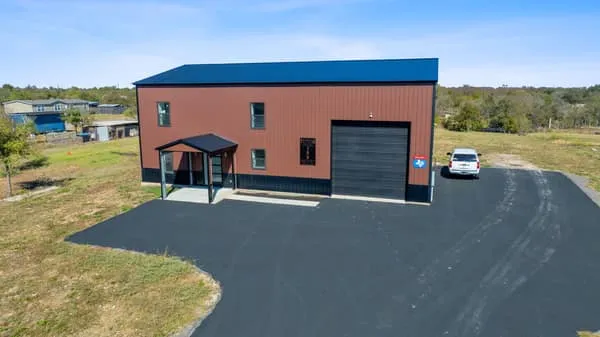 a view of swimming pool with seating space