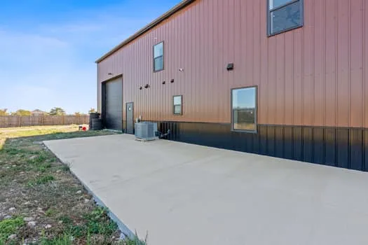 a very nice looking building with a big yard