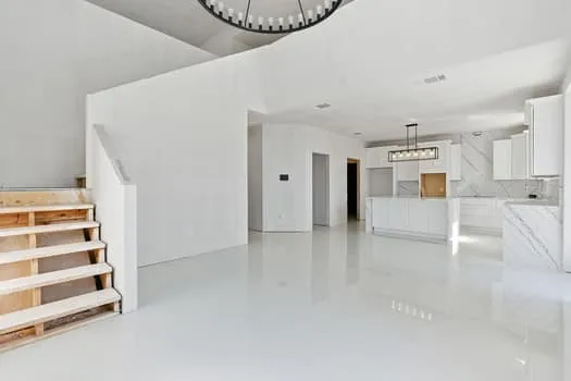 a view of a livingroom with a white building