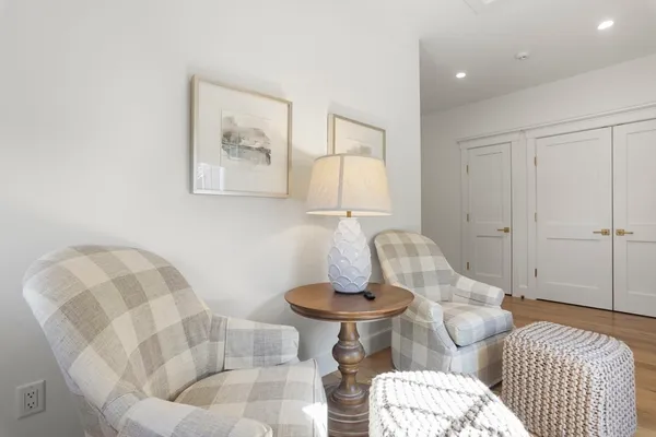 a living room with furniture and a table