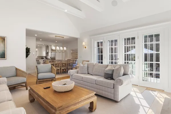 a living room with furniture and a table