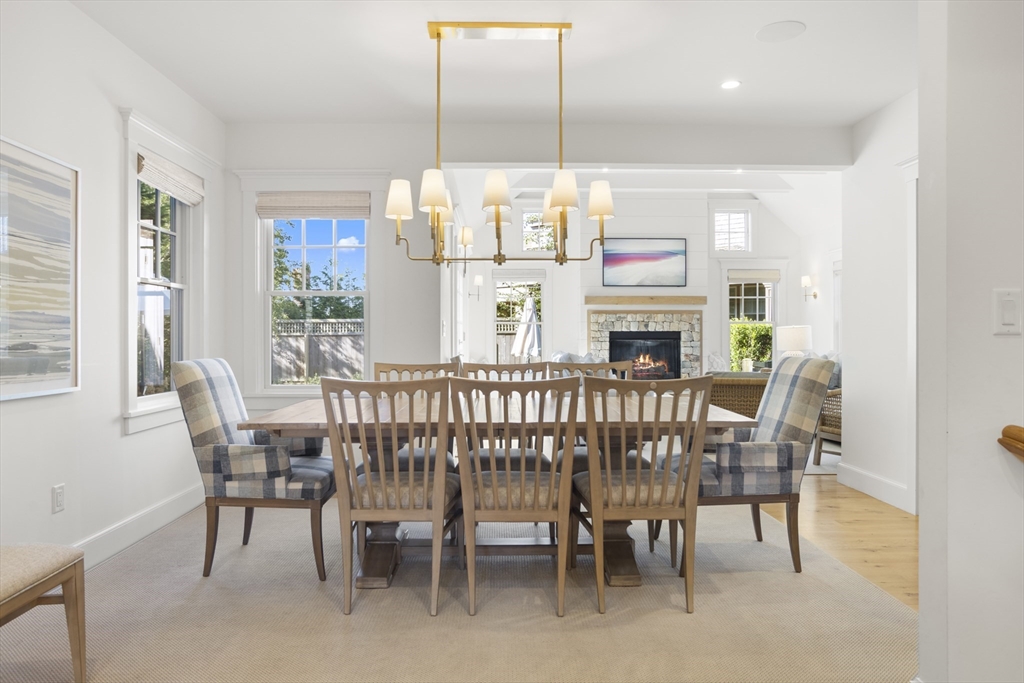 13 A Gingy Lane Nantucket, MA 02554 - Photo 5 of 29 a dining room with furniture a chandelier and window
