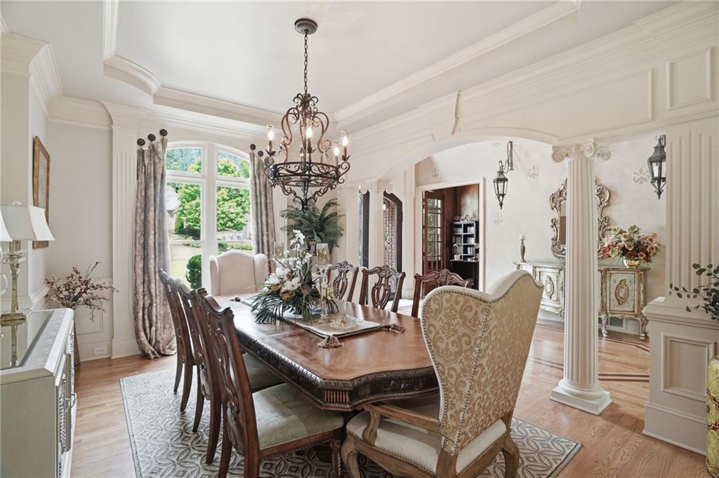 8340 Colonial Place Duluth, GA 30097 - Photo 7 of 74 a view of a dining room with furniture window and outside view