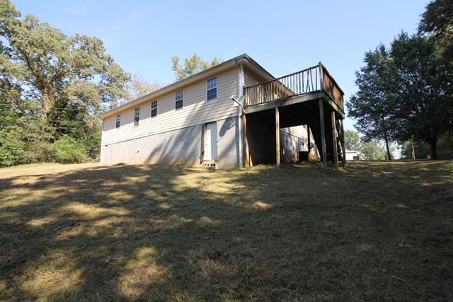 1270 W Road Clarksville, TN 37040 - Photo 21 of 25 a front view of a house with a yard