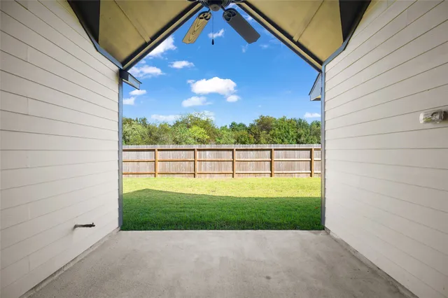 a view of a backyard with a garden