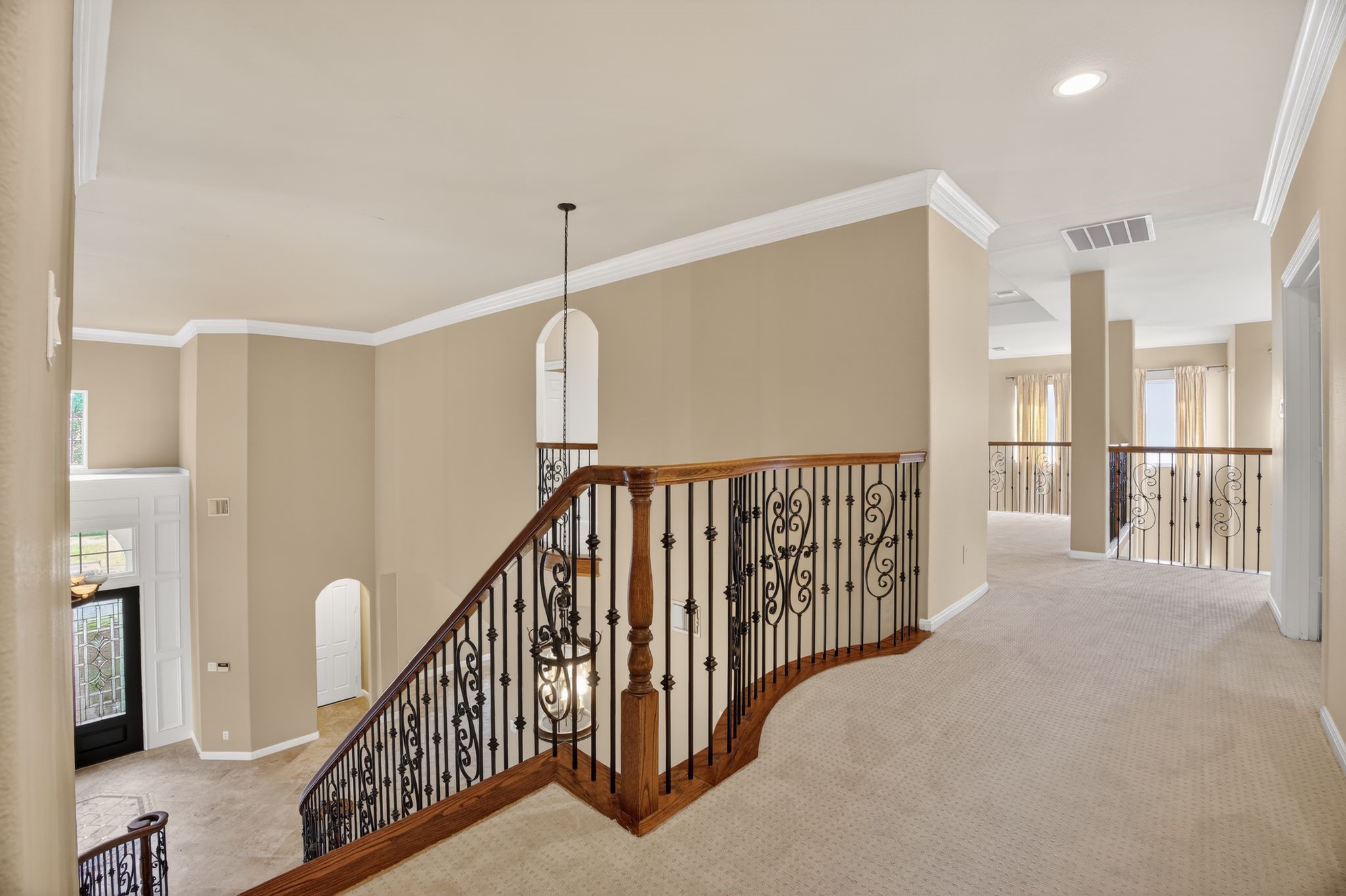 11511 Gallant Ridge Lane Houston, TX 77082 - Photo 28 of 49 a view of a hallway with windows