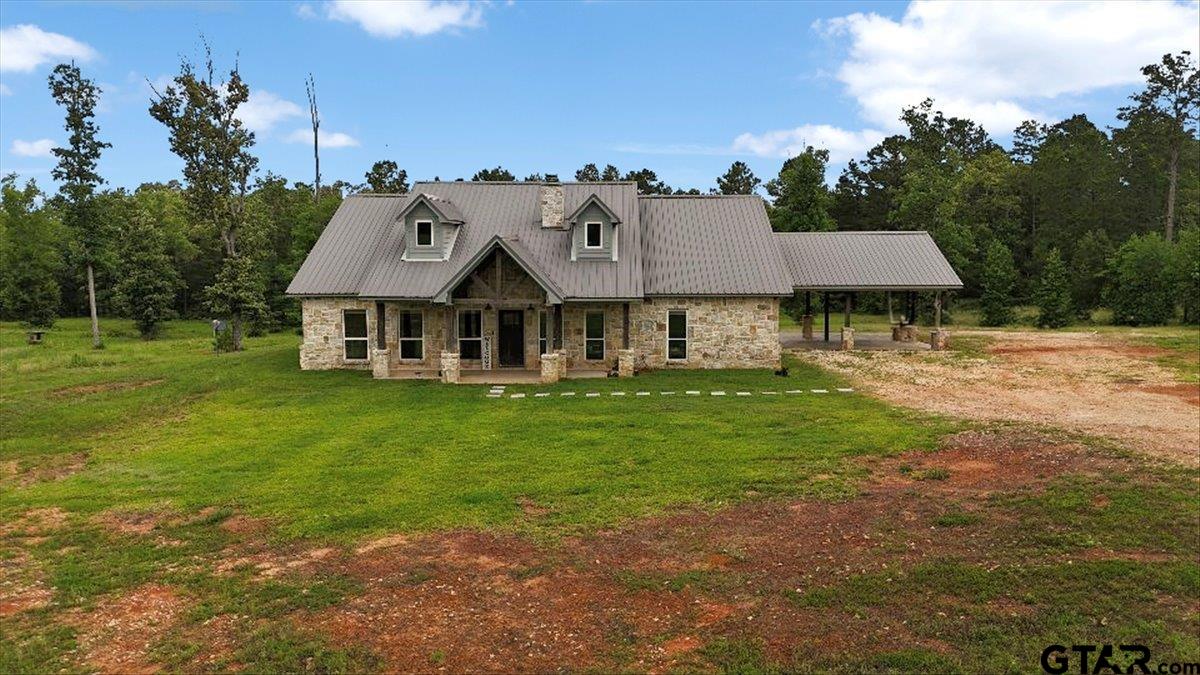 9235 Farm To Market Road 851 Rusk, TX 75785 - Photo 2 of 47 a aerial view of a house with garden