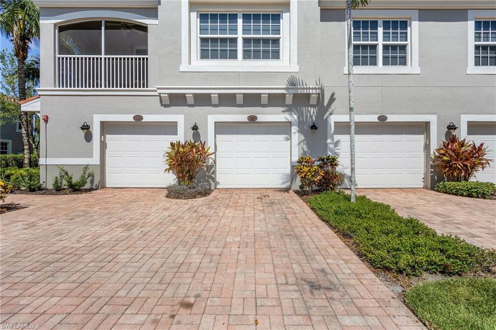 23550 Alamanda Drive, Unit 202 Estero, FL 34135 - Photo 3 of 26 a house view with a outdoor space