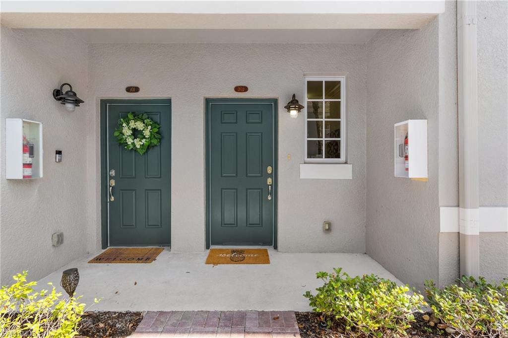 23550 Alamanda Drive, Unit 202 Estero, FL 34135 - Photo 5 of 26 a view of outdoor space