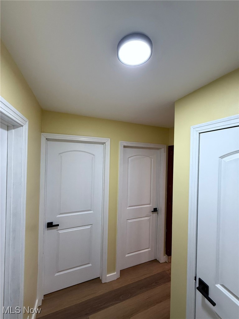4017 Kibler Toot Road Southwest Warren, OH 44481 - Photo 12 of 30 Corridor with dark hardwood / wood-style floors