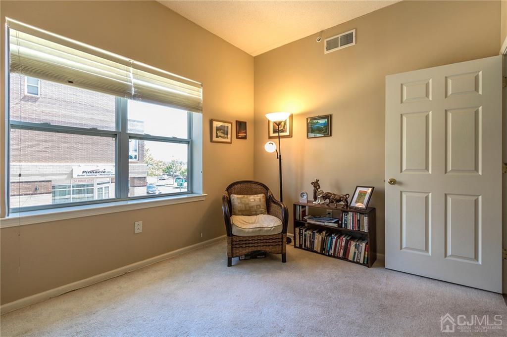358 Rector Street, Unit 222 Perth Amboy, NJ 08861 - Photo 15 of 25 a bedroom with furniture and a window