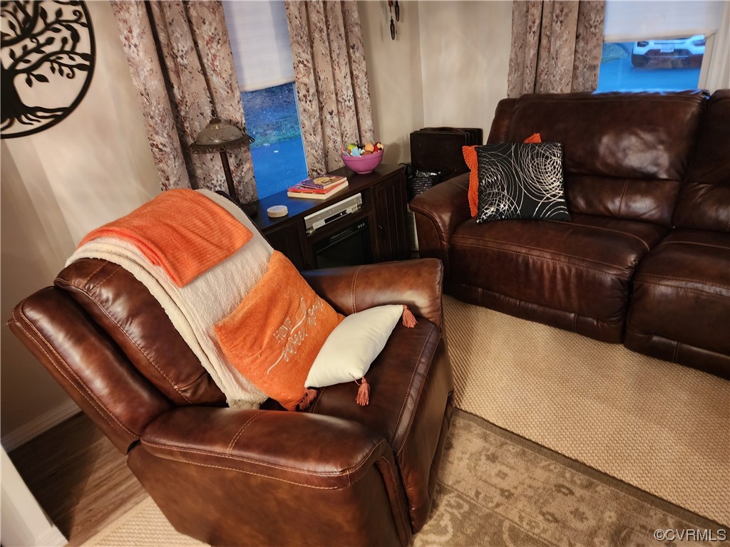 16820 Courthouse Road Dinwiddie, VA 23841 - Photo 6 of 10 a living room with furniture and a mirror