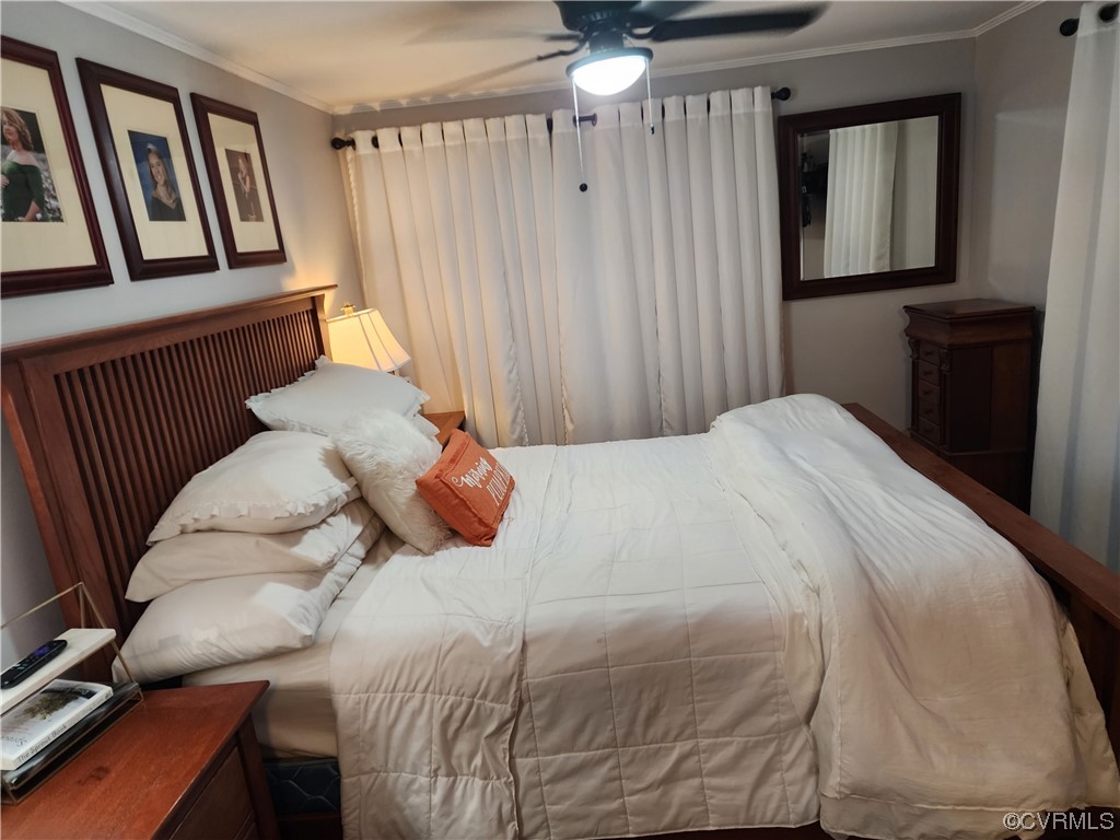 16820 Courthouse Road Dinwiddie, VA 23841 - Photo 7 of 10 a bedroom with a bed and a window