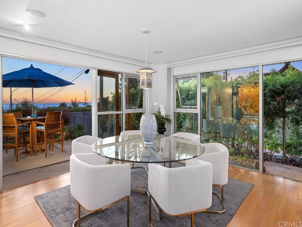 Enjoy entertaining in a dining room that opens to an ocean-view front terrace, ideal for entertaining with loved ones.