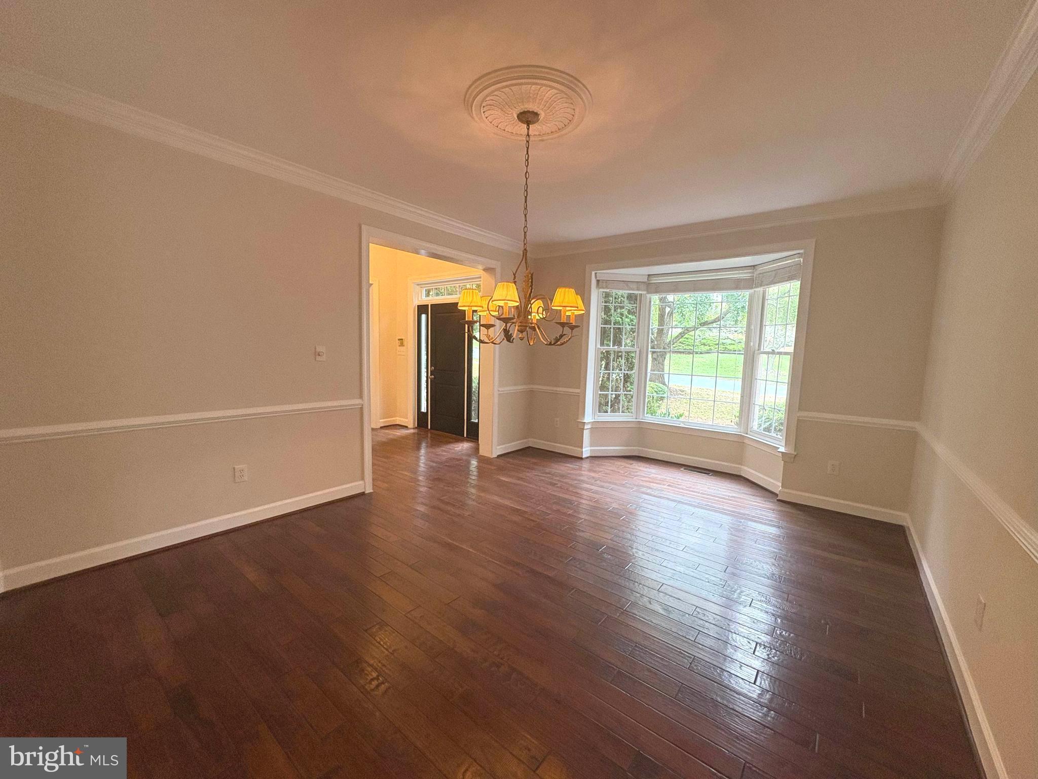 1151 Fieldview Drive Reston, VA 20194 - Photo 23 of 79 a view of an empty room with wooden floor and a window