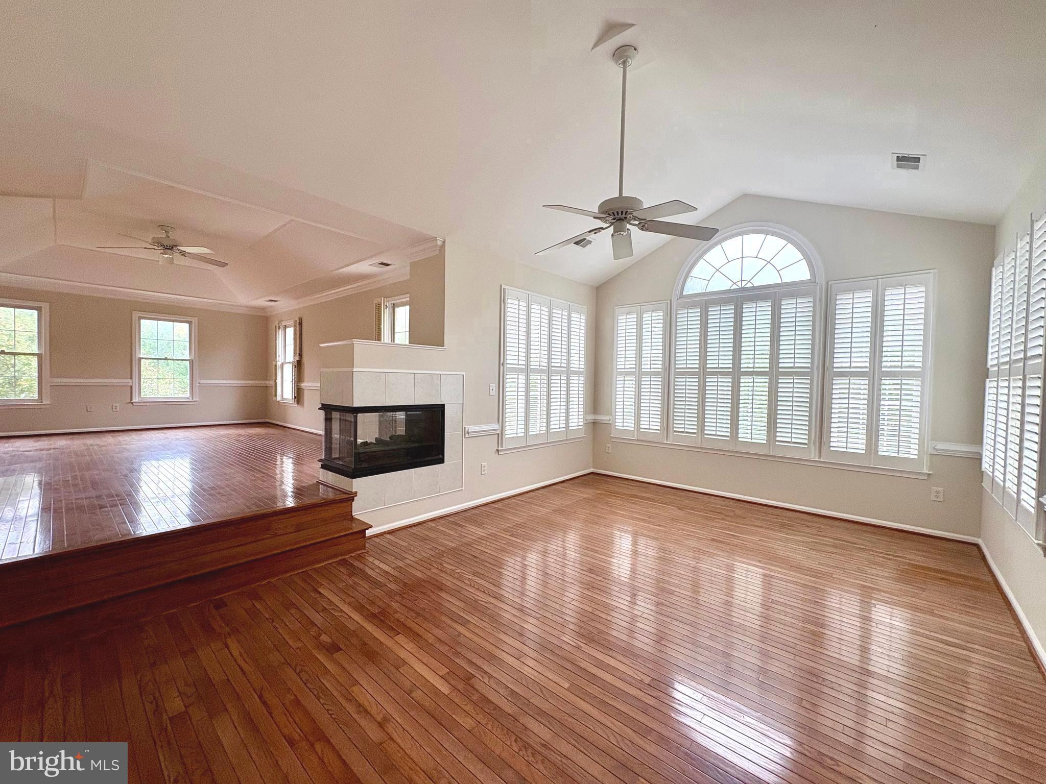 1151 Fieldview Drive Reston, VA 20194 - Photo 27 of 79 a view of a room with wooden floor and a fireplace