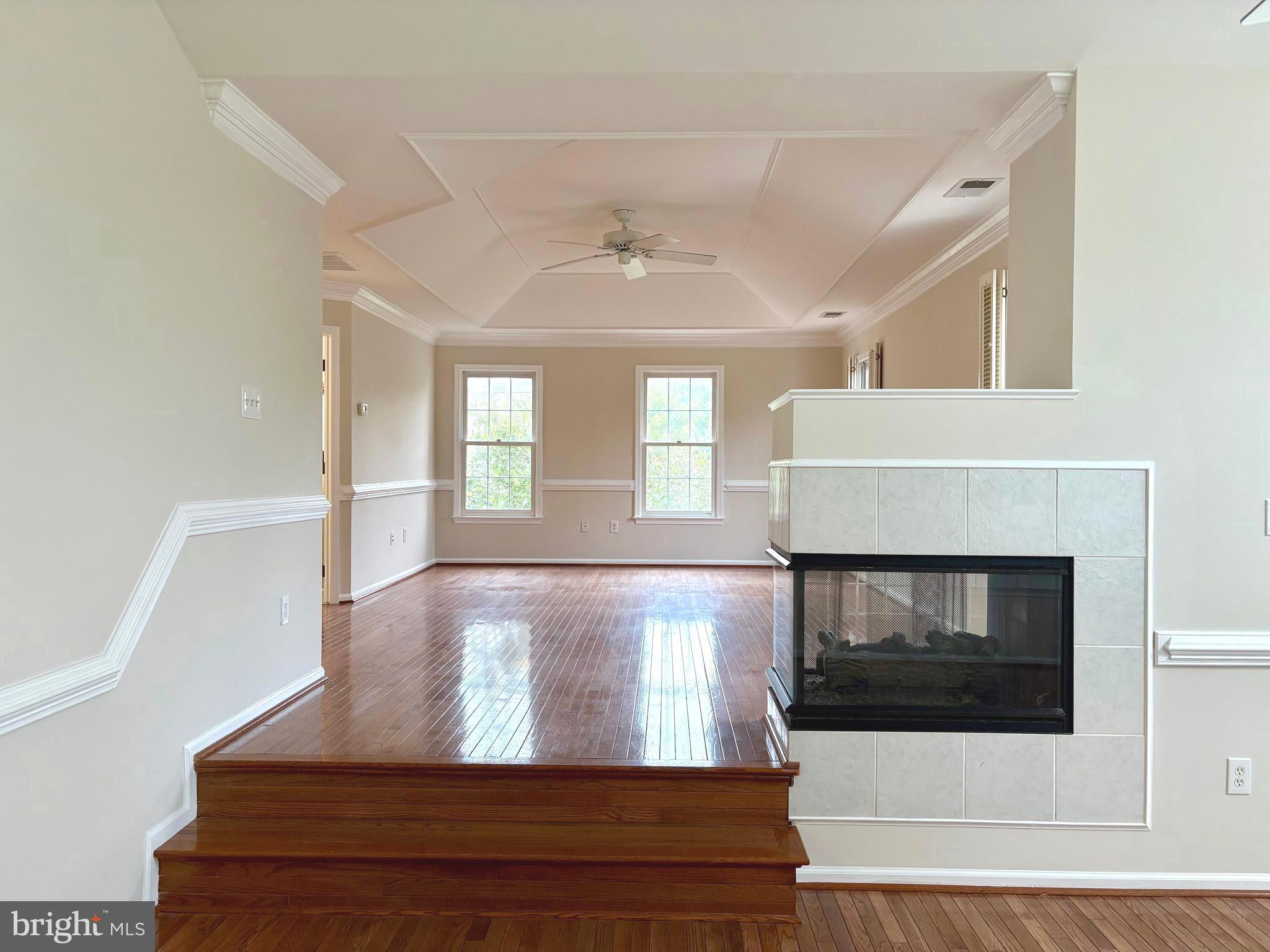 1151 Fieldview Drive Reston, VA 20194 - Photo 28 of 79 a view of an empty room with a fireplace and a window