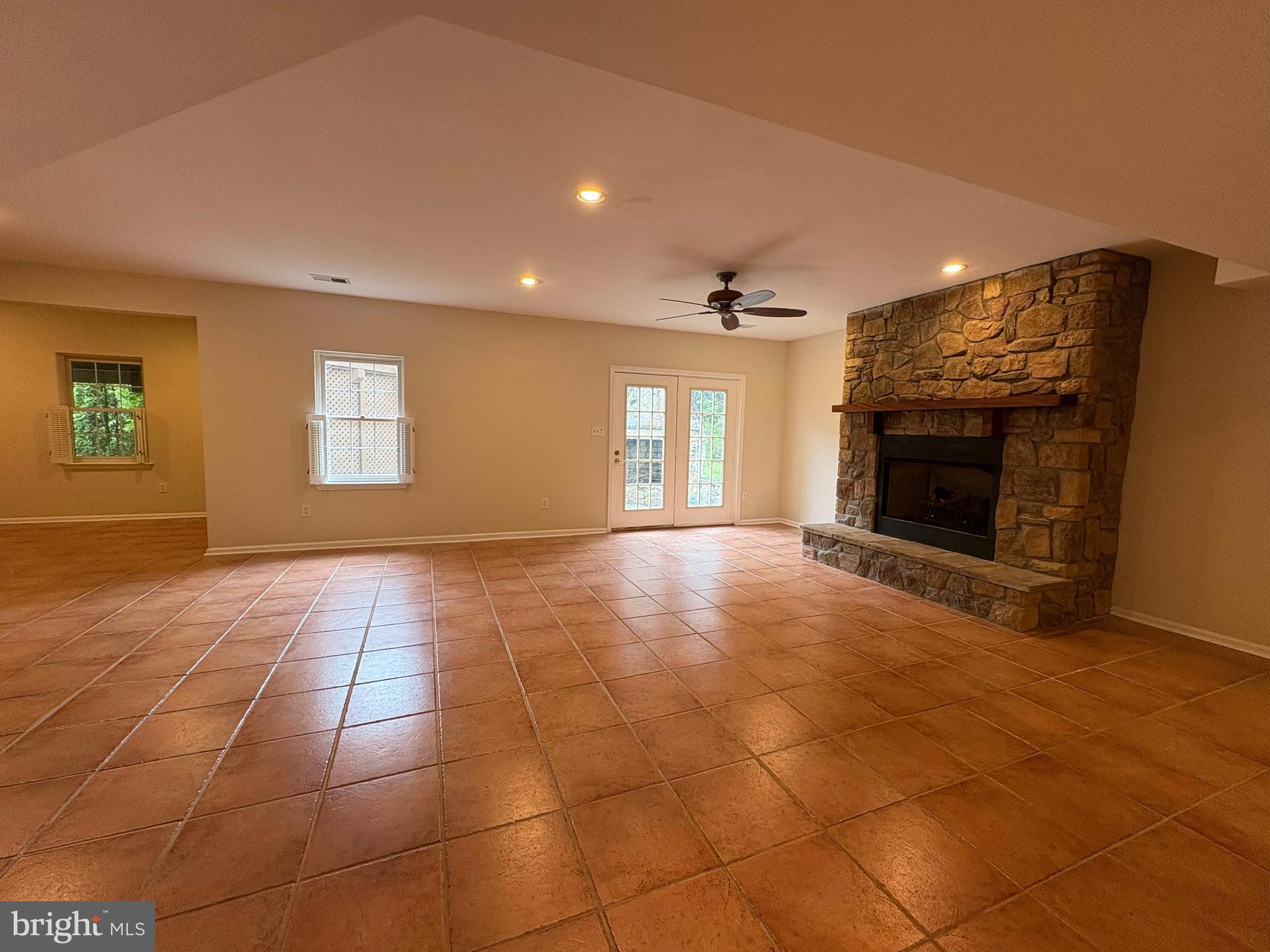 1151 Fieldview Drive Reston, VA 20194 - Photo 54 of 79 a view of an empty room with a fireplace and a window