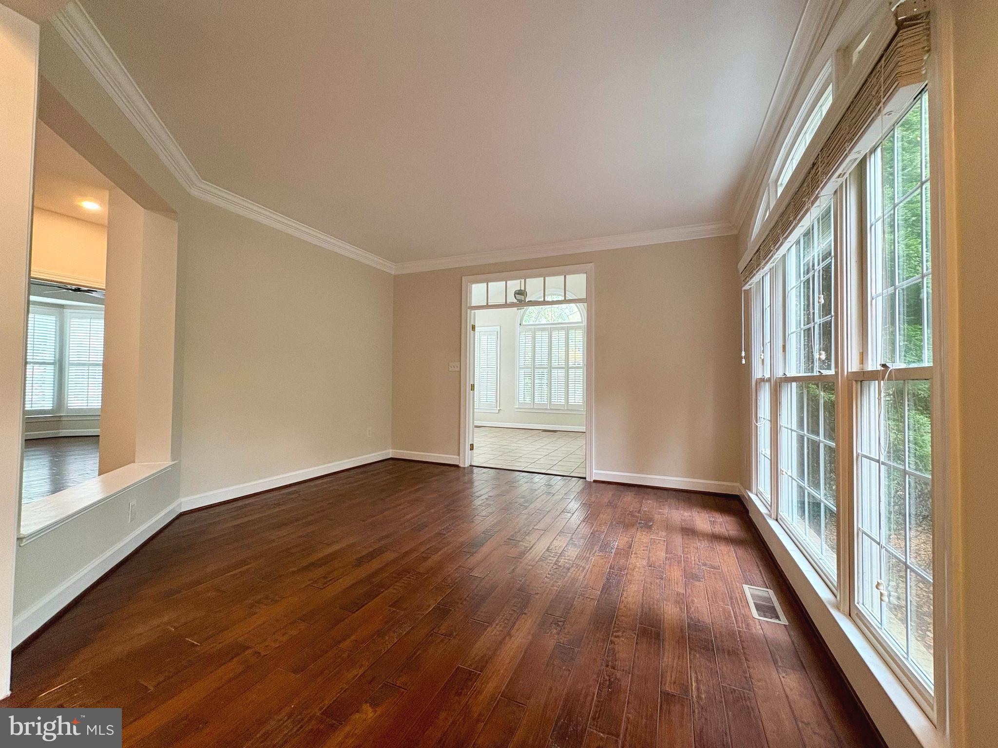 1151 Fieldview Drive Reston, VA 20194 - Photo 6 of 79 wooden floor in an empty room with a window