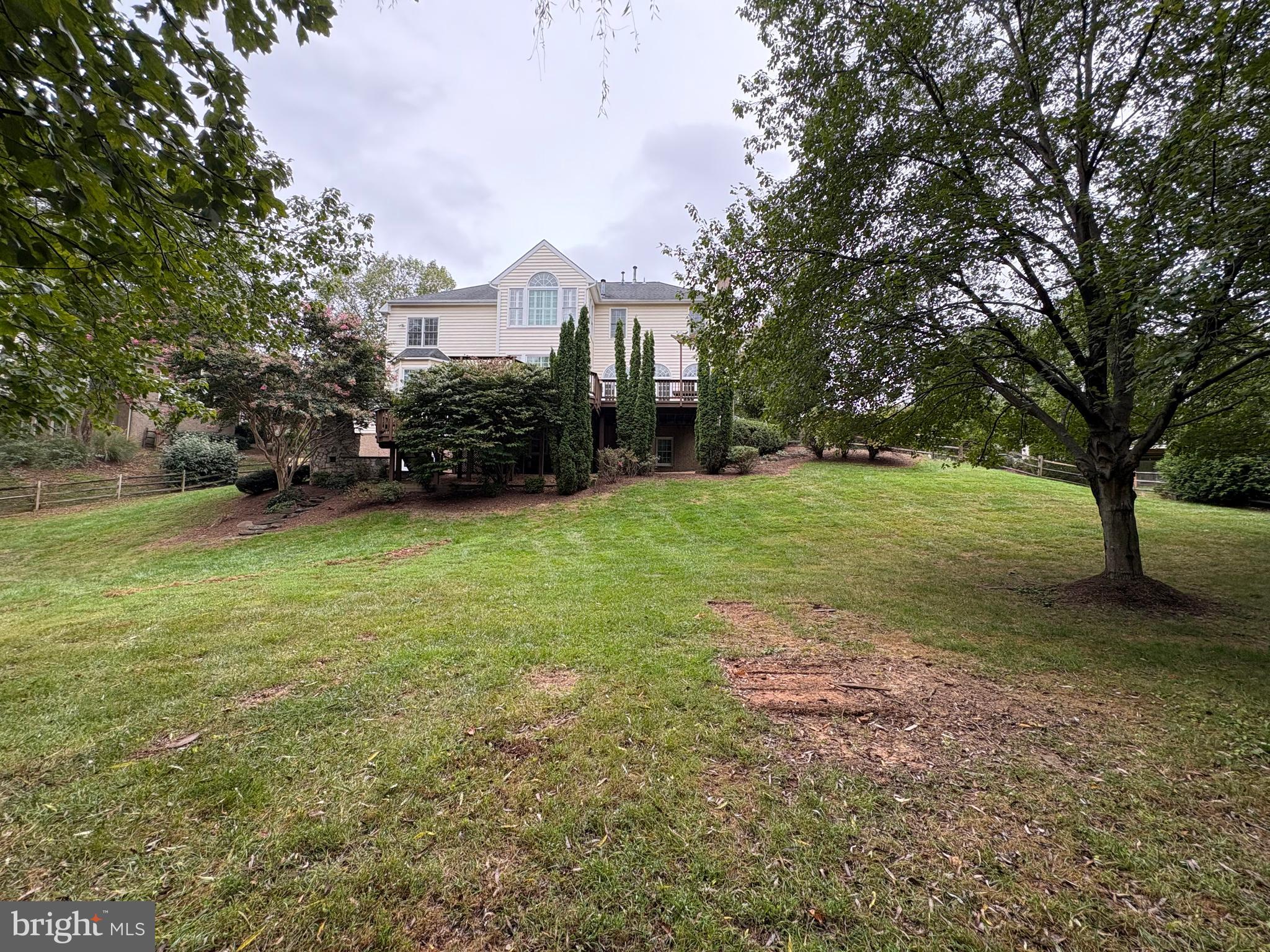 1151 Fieldview Drive Reston, VA 20194 - Photo 73 of 79 a view of a big yard with a house and large trees