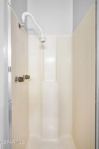 a kitchen with stainless steel appliances a refrigerator sink and stove