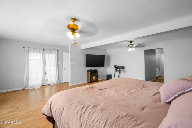 a view of a backyard with sitting area