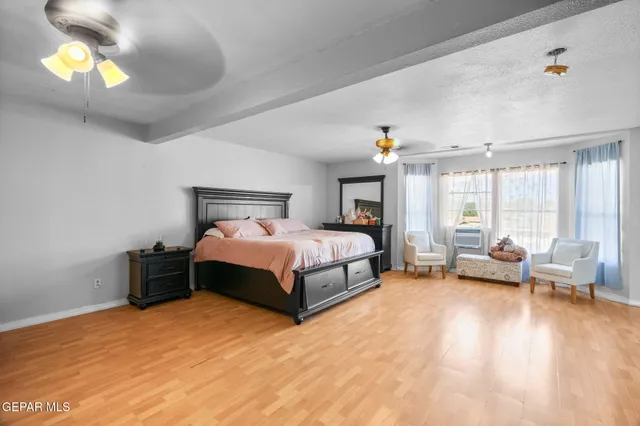 a view of a city with lawn chairs