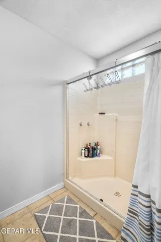 an aerial view of residential building with green space