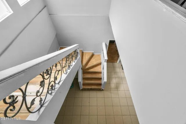 a view of house with yard and entertaining space