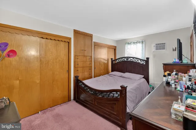 a kitchen with stainless steel appliances a stove a sink and a refrigerator