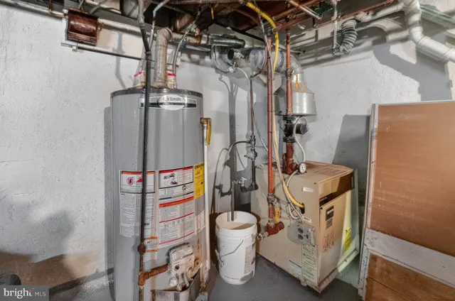 a view of backyard with a door and a window