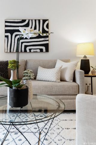 a living room with furniture and a couch