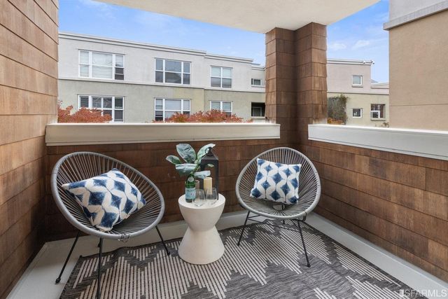 a view of a kitchen area with furniture