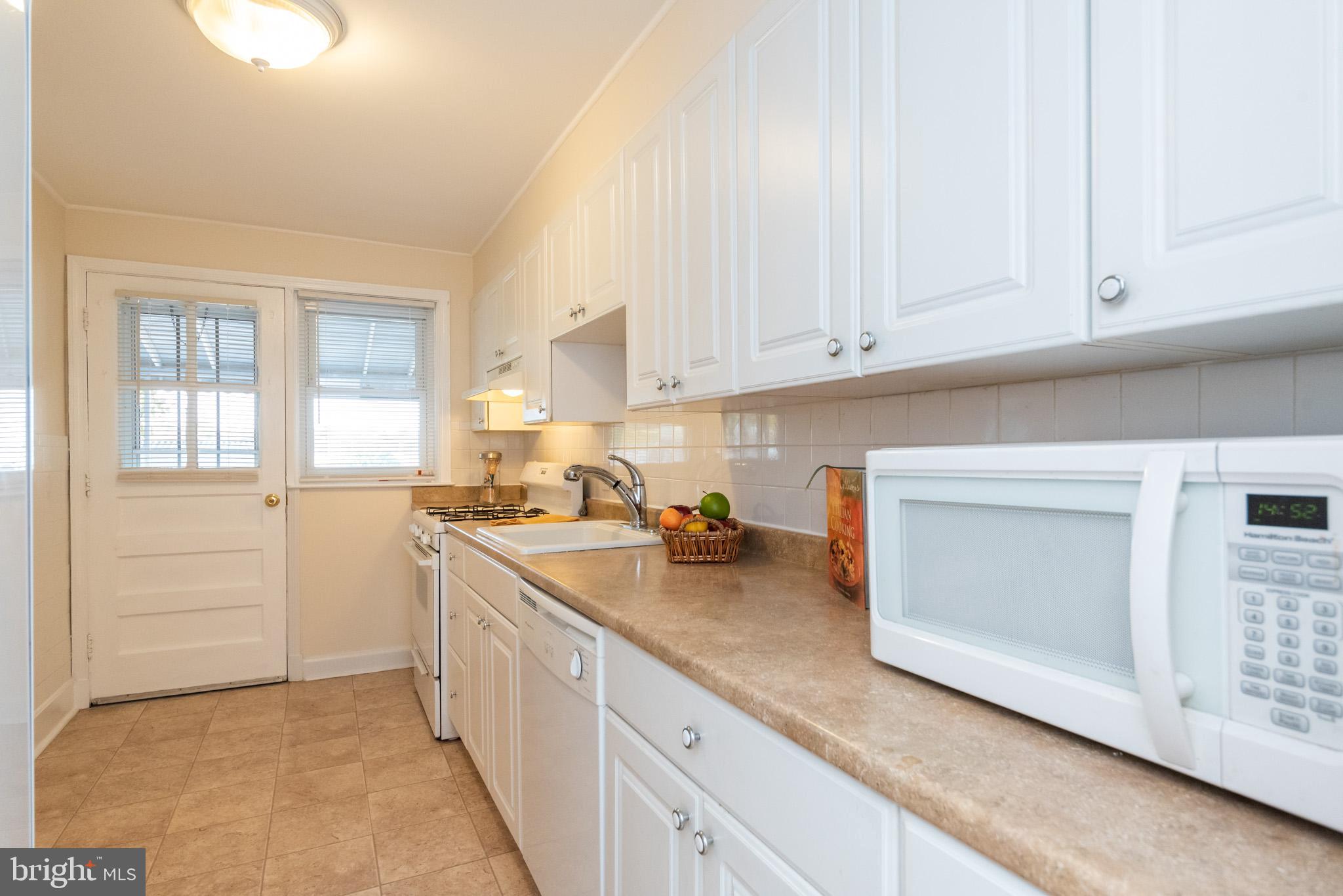 1880 Church Road Baltimore, MD 21222 - Photo 8 of 52 Light filled Kitchen w/Door to Porch