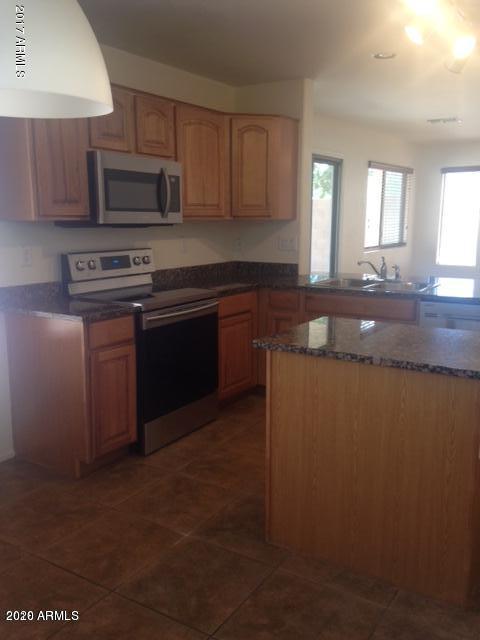 2423 West Via Dona Road Phoenix, AZ 85085 - Photo 4 of 9 20180619190324259941000000-o