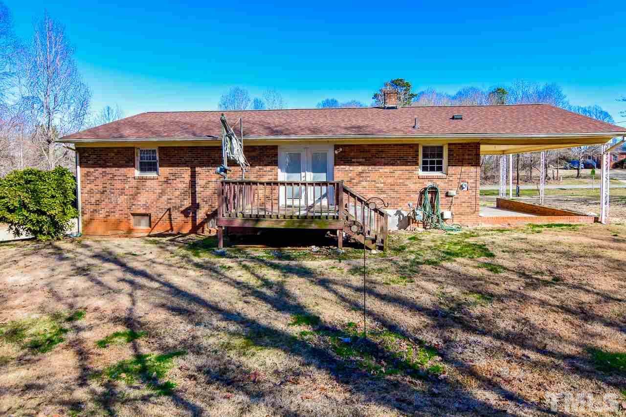 122 Henderson Road Roxboro, NC 27573 - Photo 12 of 27 an aerial view of a house with a yard