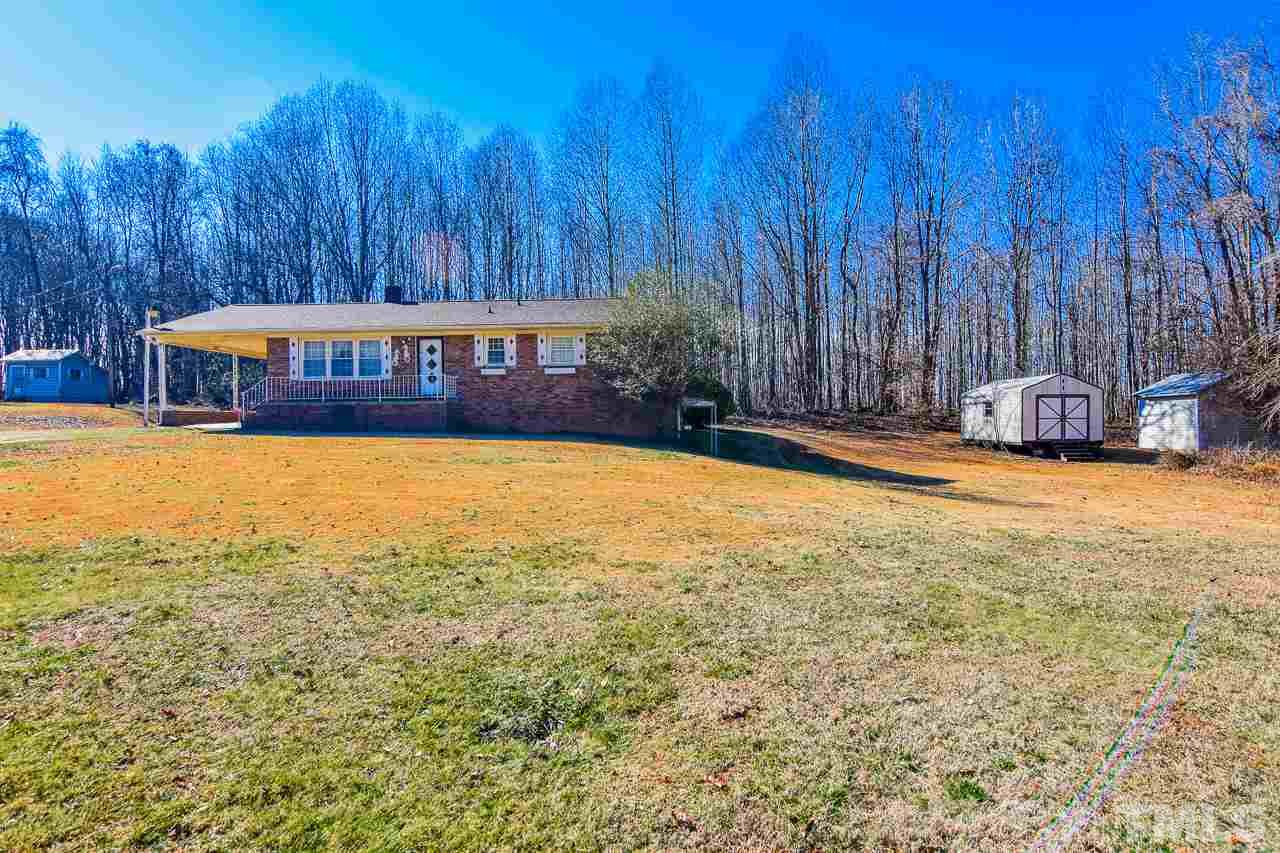 122 Henderson Road Roxboro, NC 27573 - Photo 13 of 27 a view of an outdoor space and swimming pool