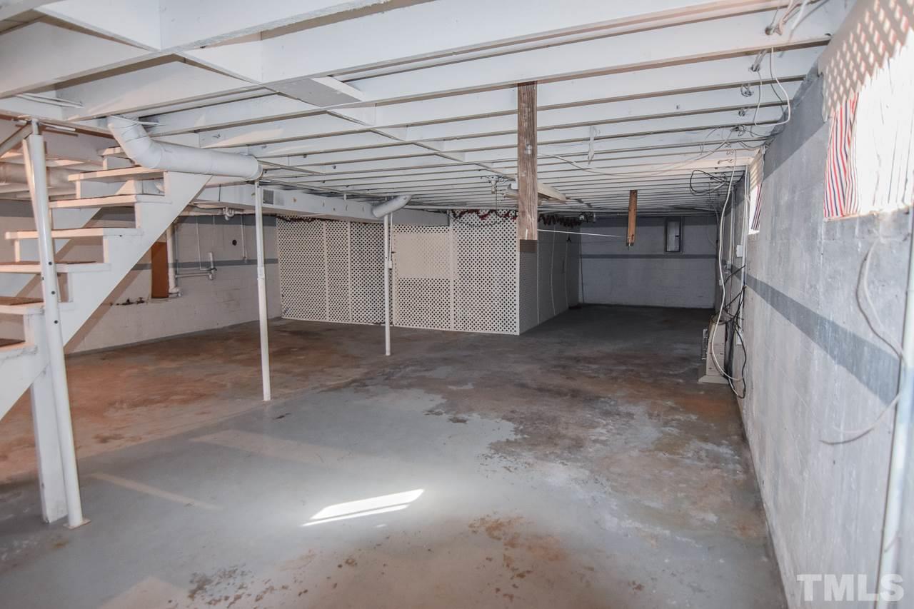 122 Henderson Road Roxboro, NC 27573 - Photo 21 of 27 a view of a room with wooden walls