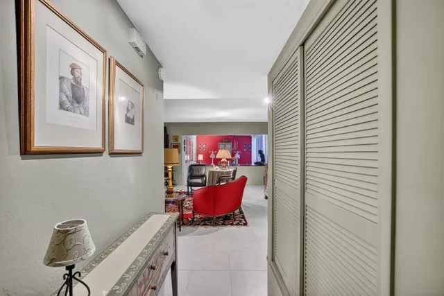 a room with furniture and air hockey table